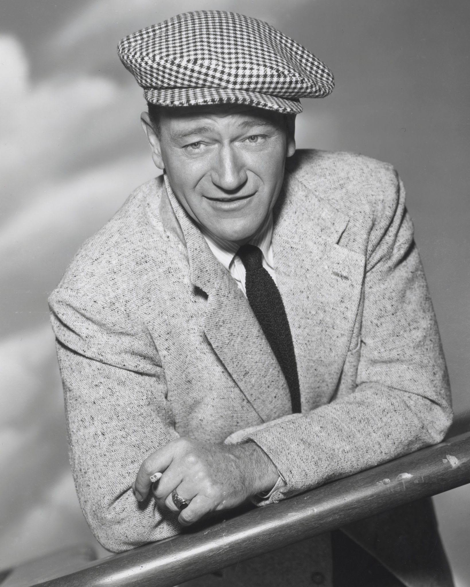 John Wayne wearing cap in a publicity portrait for John Ford's 'The Quiet Man' 1952. (Photo by Screen Archives/Getty Images)